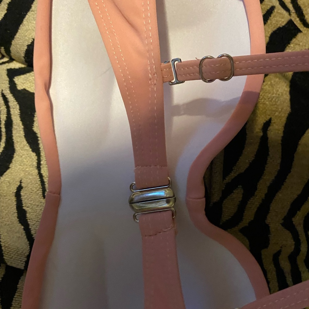 Brand new never used bathing suit top. Size medium and is super cute.
